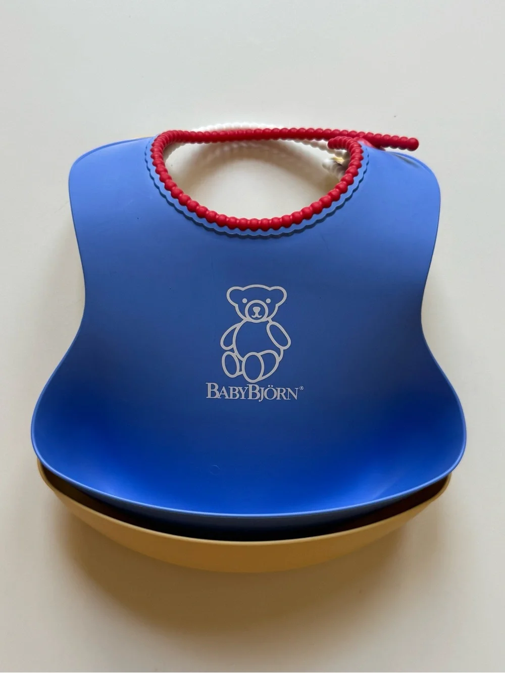 Set of 2 BabyBjorn Feeding Bibs - Blue & Yellow